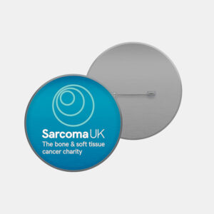 Blue badge with Sarcoma UK logo on it