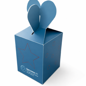 Flatpack white cardboard lantern with flower shape cutout top showing LED candle packaging